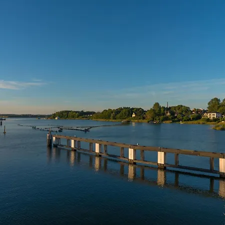 Hébergement de vacances Sea Breeze: Meerblick, Sauna, Dachterrasse, Bootsanleger Olpenitz