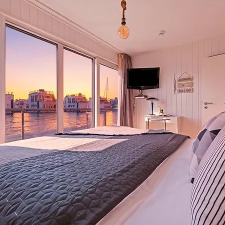 Sea Breeze: Meerblick, Sauna, Dachterrasse, Bootsanleger Hébergement de vacances Olpenitz